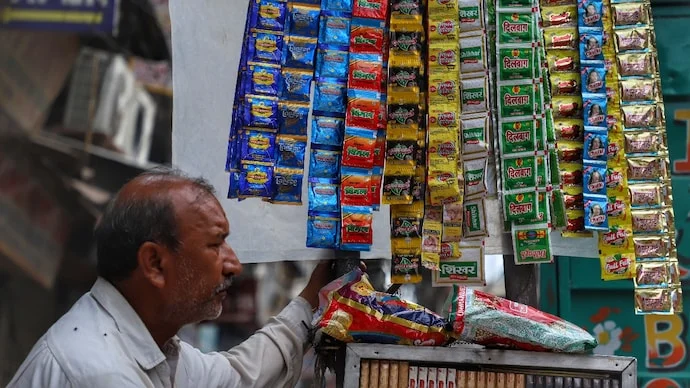 a-vendor-selling-tobacco-related-items-and-pan-masala-waits-for-the-customers-in-the-old-quarters-of-111223811-16x9_0